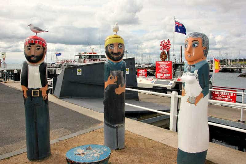 Geelong Baywalk Bollards with sea gulls perched on their heads. 