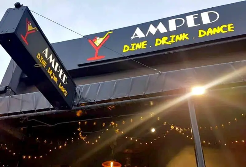 The front window and sign of Amped Geelong.