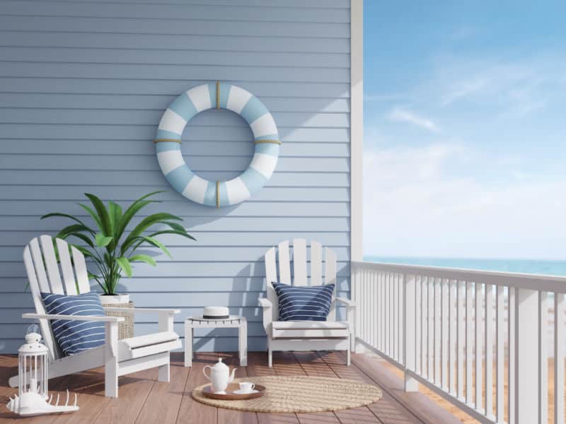 Best accommodation Anglesea Great Ocean Road with balcony chairs and blue sky.