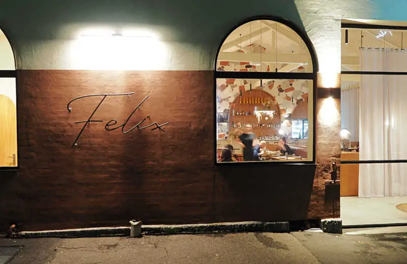 Felix restaurant in Geelong sign with a view of diners through the window.