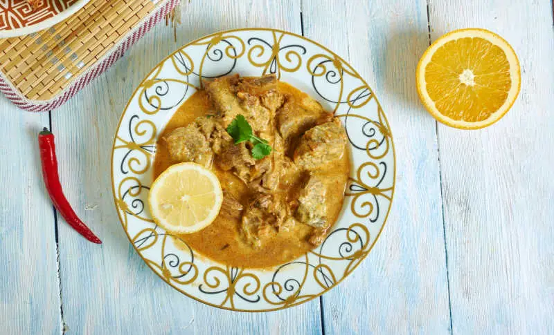 Picture of a curry dish with lemon at an Indian restaurant in Geelong.