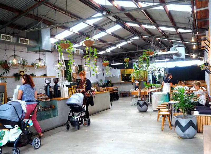 Picture of women with prams at the counter of King Of The Castle.