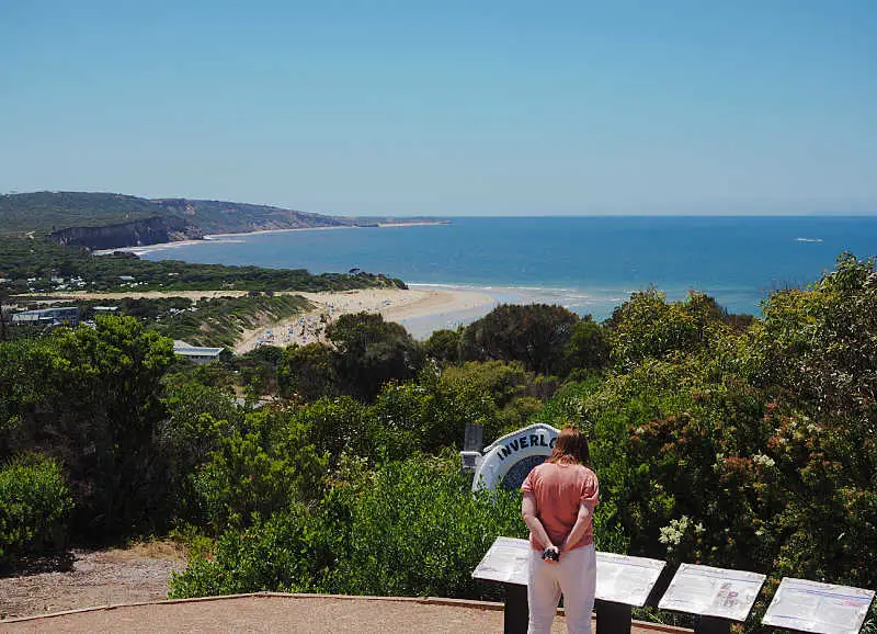 Woman reading information at Loveridge Lookout one of the great things to see in Anglesea Victoria.