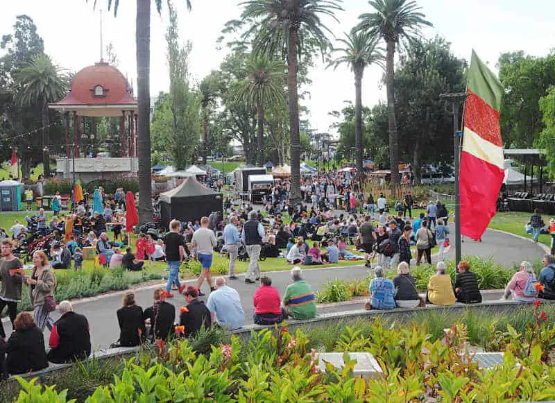 People and flag at the Nightjar Festival Geelong.