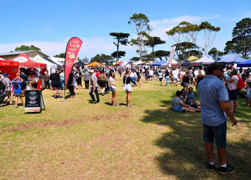 People and market stalls at the Portarlington Mussel Festival.