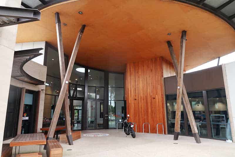 Entrance to the Rachinger Gallery in Geelong at the Eastern Hub with a parked motor bike under the front portico.