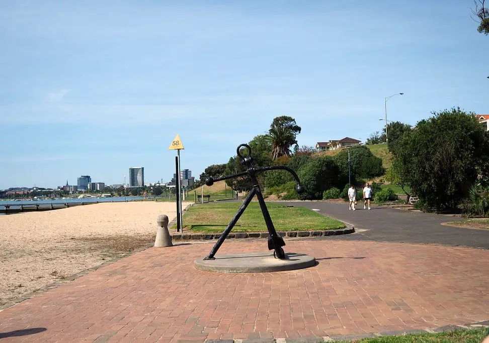 Photo of Rippleside Park beach and path with people walking.