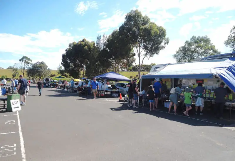 People shopping at the Saturday morning Belmont Market