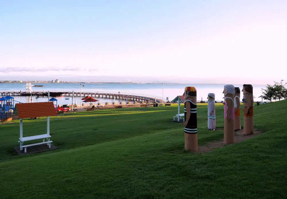 Bollards overlooking Eastern Beach in Geelong Australia at sunrise.