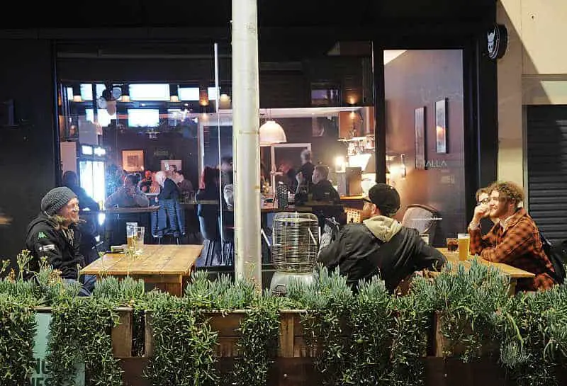 People relaxing with a beer at Valhalla Brewery in Geelong.