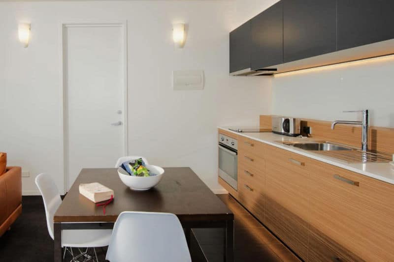 Dining and kitchen area at the Vue Apartments Geelong Waterfront.