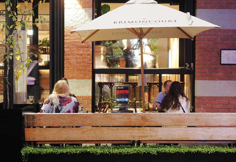 People sitting outside at Westend Geelong in Little Malop Street having a drink.